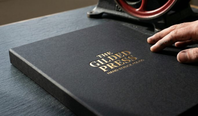 An image of an A5 box hot foil printed by the gilded press.